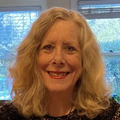 Wendy Kliewer, Ph.D., in front of a window