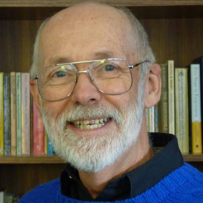 Everett L. Worthington Jr., Ph.D., in front of a bookcase